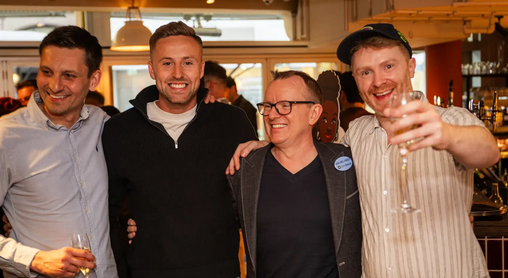 Barry Oulton with three guests raising a glass at the EduStack launch event, London, May 2026.